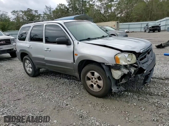 2003 Mazda Tribute LX with VIN 4F2YZ04153KM20941, listed as a Copart auction lot 82683264 with 195,240 mi miles and Salvage Title. Bid and sale history available at DreamBid. Image 11.