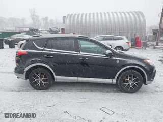 2017 Toyota RAV4 SE with VIN 2T3JFREV5HW591932, listed as a IAAI auction lot 41628183 with 142,599 mi miles. Bid and sale history available at carsss.com. Image 13.
