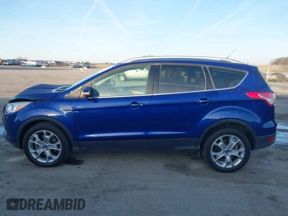 2014 Ford Escape Titanium with VIN 1FMCU9JX4EUD30964, listed as a IAAI auction lot 41772153 with 179,481 mi miles and . Bid and sale history available at DreamBid. Image 14.