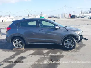 2018 Honda HR-V LX with VIN 3CZRU6H35JG719653, listed as a IAAI auction lot 41956051 with 74,307 mi miles. Bid and sale history available at carsss.com. Image 13.