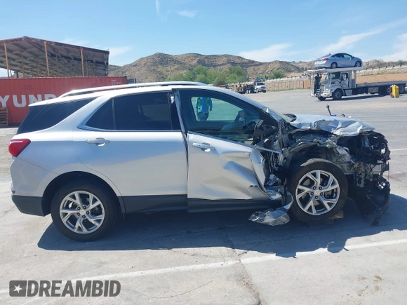 2020 Chevrolet Equinox LT with VIN 3GNAXLEX2LS609943, listed as a IAAI auction lot 42014464 with 80,942 mi miles. Bid and sale history available at carsss.com. Image 14.