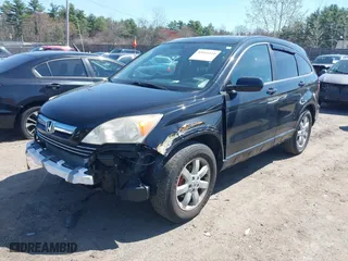 2009 Honda CR-V EX-L with VIN JHLRE48799C012129, listed as a IAAI auction lot 42016110 with 141,819 mi miles. Bid and sale history available at carsss.com. Image 19.