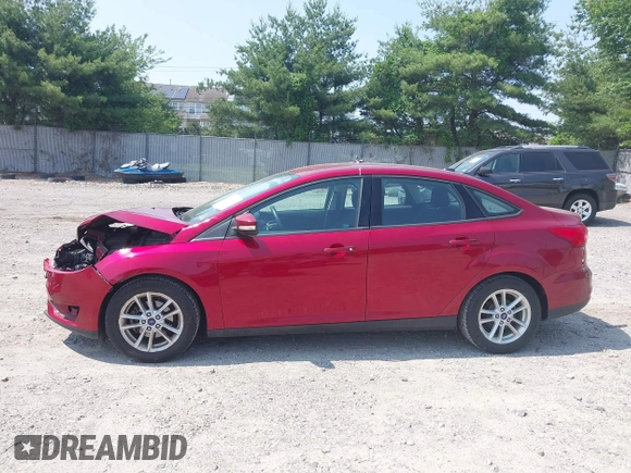 2017 Ford Focus SE z VIN 1FADP3F26HL305624, wystawiony jako IAAI lot #42411111 z przebiegiem 58 865 mil mil oraz . Historia ofert i sprzedaży dostępna na DreamBid. Obrazek 14.