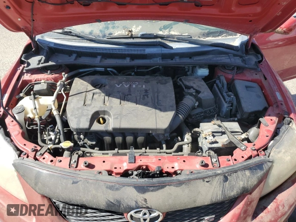 2010 Toyota Corolla z VIN 1NXBU4EE3AZ197969, wystawiony jako Copart lot #60699805 z przebiegiem 197 072 mil mil oraz Szkoda całkowita • Salvage title. Historia ofert i sprzedaży dostępna na DreamBid. Obrazek 11.