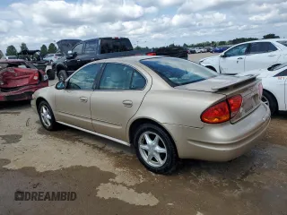 2002 Oldsmobile Alero GL1 with VIN 1G3NL52E62C181352, listed as a Copart auction lot 66348333 with 104,540 mi miles and Salvage Title. Bid and sale history available at DreamBid. Image 2.