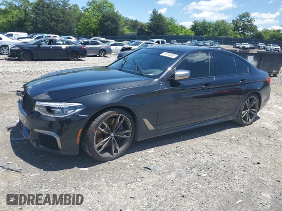 2019 BMW 5 Series M550i xDrive with VIN WBAJB9C53KB289356, listed as a Copart auction lot 57814535 with 60,454 mi miles and Clean title. Bid and sale history available at DreamBid. Image 1.