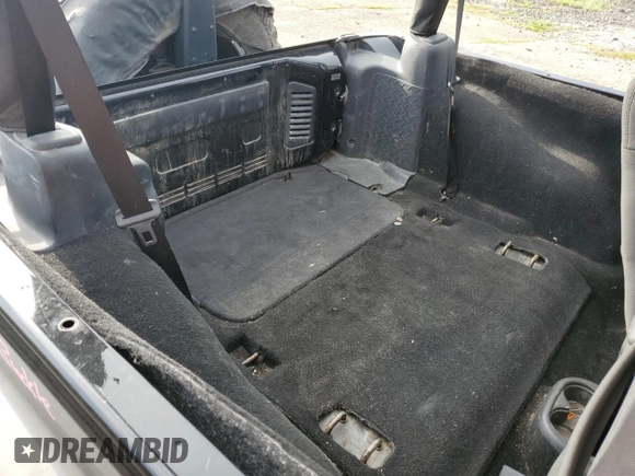 2011 Jeep Wrangler Rubicon with VIN 1J4BA6D12BL507652, listed as a Copart auction lot 69989964 with 127,493 mi miles and Salvage title. Bid and sale history available at DreamBid. Image 10.