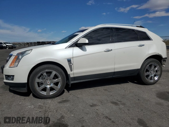 2012 Cadillac SRX Performance Collection with VIN 3GYFNBE33CS540914, listed as a Copart auction lot 54787125 with 130,357 mi miles and Salvage title. Bid and sale history available at DreamBid. Image 1.
