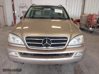 2005 Mercedes-Benz M-Class 5.0L with VIN 4JGAB75E05A525942, listed as a IAAI auction lot 42012823 with 176,682 mi miles. Bid and sale history available at carsss.com. Image 6.