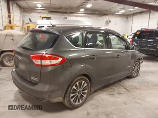 2018 Ford C-Max Titanium with VIN 1FADP5DU5JL101340, listed as a IAAI auction lot 41816730 with 102,207 mi miles and . Bid and sale history available at DreamBid. Image 4.
