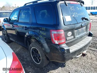 2009 Ford Escape XLT with VIN 1FMCU93G59KB55025, listed as a IAAI auction lot 41756362 with 999,999 mi miles. Bid and sale history available at carsss.com. Image 3.