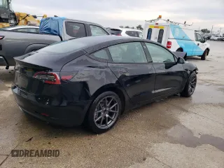 2022 Tesla Model 3 with VIN 5YJ3E1EA6NF188263, listed as a Copart auction lot 77542203 with 75,461 mi miles and Non Repairable. Bid and sale history available at DreamBid. Image 3.