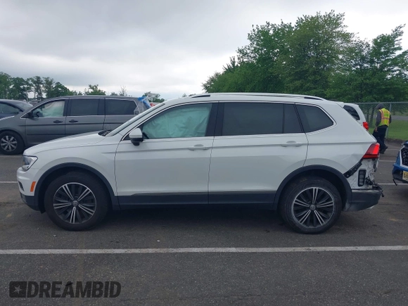 2018 Volkswagen Tiguan SEL with VIN 3VV2B7AX4JM012840, listed as a IAAI auction lot 42263511 with 105,510 mi miles and . Bid and sale history available at DreamBid. Image 14.