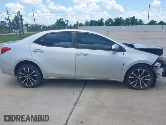 2017 Toyota Corolla L z VIN 5YFBURHE4HP732912, wystawiony jako IAAI lot #42451597 z przebiegiem 73 901 mil mil oraz . Historia ofert i sprzedaży dostępna na DreamBid. Obrazek 5.