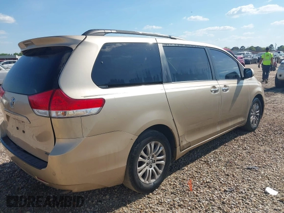 2011 Toyota Sienna XLE AAS with VIN 5TDYK3DC4BS013644, listed as a IAAI auction lot 41905759 with 208,800 mi miles and . Bid and sale history available at DreamBid. Image 4.