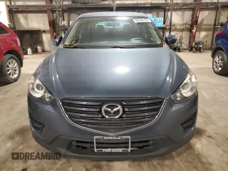 2016 Mazda CX-5 Sport with VIN JM3KE4BY9G0786547, listed as a Copart auction lot 60169155 with 151,599 mi miles and Clean title. Bid and sale history available at DreamBid. Image 5.