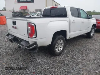 2018 GMC Canyon z VIN 1GTG5CE14J1134654, wystawiony jako IAAI lot #42203541 z przebiegiem 147 881 mil mil oraz . Historia ofert i sprzedaży dostępna na DreamBid. Obrazek 4.