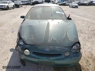 1997 Ford Taurus LX with VIN 1FALP53S1VG316689, listed as a Copart auction lot 67168694 with 211,414 mi miles and Salvage Title. Bid and sale history available at carsss.com. Image 5.