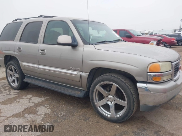 2003 GMC Yukon SLT with VIN 1GKEC13V33J287668, listed as a IAAI auction lot 41561108 with 326,719 mi miles. Bid and sale history available at carsss.com. Image 1.