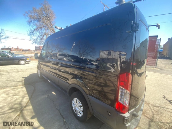 2015 Ford Transit Cargo Van with VIN 1FTNR2CM3FKA14543, listed as a Copart auction lot 52865615 with 157,133 mi miles and Clean Title. Bid and sale history available at carsss.com. Image 3.