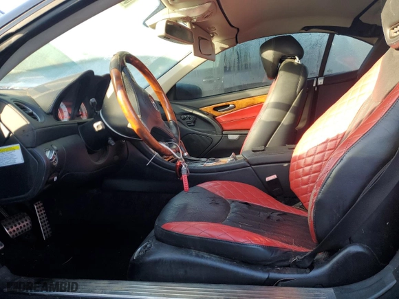2009 Mercedes-Benz SL-Class V8 with VIN WDBSK71FX9F153802, listed as a Copart auction lot 83872604 with 0 mi miles and Salvage Title. Bid and sale history available at carsss.com. Image 7.