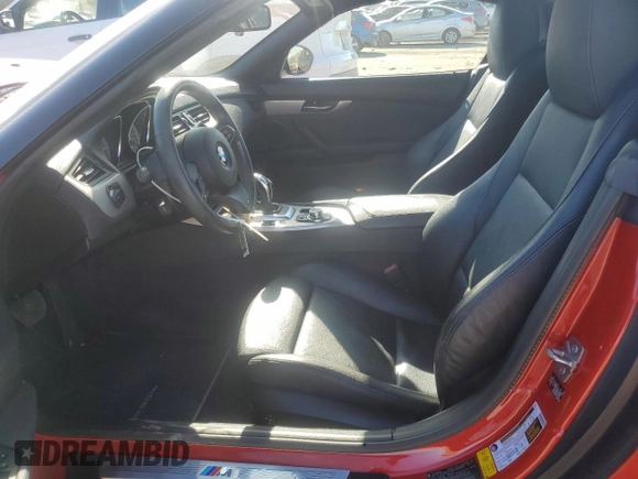 2012 BMW Z4 sDrive35is with VIN WBALM1C58CE633610, listed as a Copart auction lot 42824955 with 84,901 mi miles and Salvage title. Bid and sale history available at DreamBid. Image 7.