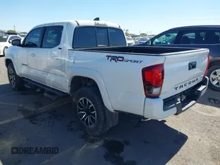 2021 Toyota Tacoma SR with VIN 3TYAX5GN5MT014868, listed as a IAAI auction lot 41549927 with 30,653 mi miles and . Bid and sale history available at DreamBid. Image 3.