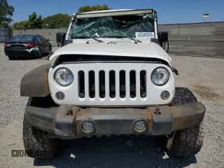 2016 Jeep Wrangler Unlimited Sport with VIN 1C4BJWDG0GL309976, listed as a Copart auction lot 63340505 with 66,714 mi miles and Salvage title. Bid and sale history available at DreamBid. Image 5.
