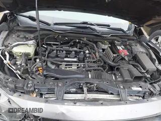 2017 Honda Civic EX-T with VIN 19XFC1F34HE014334, listed as a IAAI auction lot 42009311 with 124,717 mi miles. Bid and sale history available at carsss.com. Image 10.