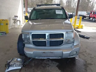 2007 Dodge Nitro SLT with VIN 1D8GU58K97W616701, listed as a IAAI auction lot 41666666 with 174,052 mi miles and . Bid and sale history available at carsss.com. Image 12.