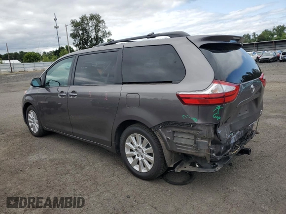 2015 Toyota Sienna Limited with VIN 5TDDK3DC4FS096402, listed as a Copart auction lot 59306665 with 117,012 mi miles and Salvage title. Bid and sale history available at DreamBid. Image 2.