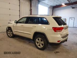 2011 Jeep Grand Cherokee 70th Anniversary with VIN 1J4RR4GG4BC702759, listed as a IAAI auction lot 41871604 with 143,583 mi miles. Bid and sale history available at carsss.com. Image 3.