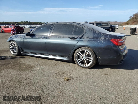 2019 BMW 7 Series 740i xDrive z VIN WBA7E4C56KGV70297, wystawiony jako Copart lot #78858504 z przebiegiem 81 874 mil mil oraz Szkoda całkowita • Salvage title. Historia ofert i sprzedaży dostępna na DreamBid. Obrazek 2.