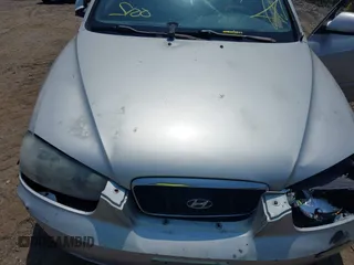 2003 Hyundai Elantra GLS z VIN KMHDN45D63U571345, wystawiony jako IAAI lot #39897105 z przebiegiem 156 805 mil mil oraz . Historia ofert i sprzedaży dostępna na DreamBid. Obrazek 10.