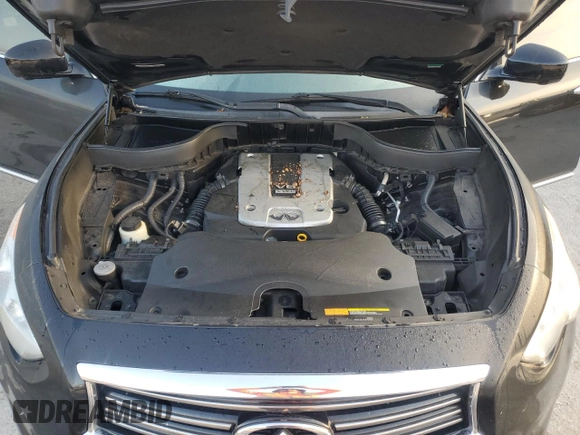 2014 Infiniti QX70 with VIN JN8CS1MU9EM450664, listed as a Copart auction lot 50768775 with 121,566 mi miles and Salvage Title. Bid and sale history available at DreamBid. Image 12.