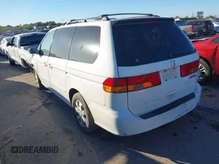 2002 Honda Odyssey EX z VIN 2HKRL18602H522128, wystawiony jako IAAI lot #40879648 z przebiegiem Nie podano mil oraz . Historia ofert i sprzedaży dostępna na DreamBid. Obrazek 3.