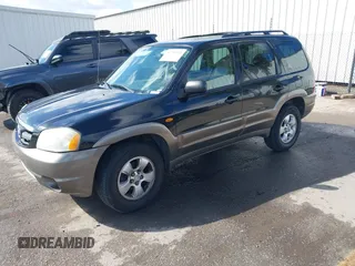 2004 Mazda Tribute LX with VIN 4F2CZ941X4KM29568, listed as a IAAI auction lot 41735353 with 285,989 mi miles and . Bid and sale history available at carsss.com. Image 2.