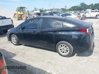 2021 Toyota Prius L Eco z VIN JTDKAMFU6M3141392, wystawiony jako IAAI lot #42317866 z przebiegiem 137 495 mil mil oraz . Historia ofert i sprzedaży dostępna na DreamBid. Obrazek 13.