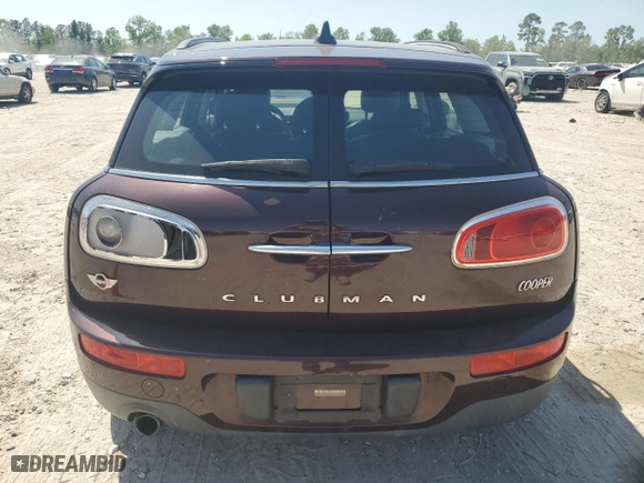 2016 MINI Cooper Clubman with VIN WMWLN5C53G2E29697, listed as a Copart auction lot 52791585 with 115,213 mi miles and Clean Title. Bid and sale history available at carsss.com. Image 6.