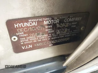 2002 Hyundai Santa Fe GLS with VIN KM8SC73D62U209998, listed as a IAAI auction lot 41915060 with 228,451 mi miles. Bid and sale history available at carsss.com. Image 9.