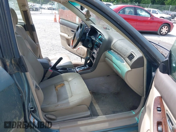 2002 Subaru Legacy Outback with VIN 4S3BE896127209841, listed as a IAAI auction lot 42494011 with 242,313 mi miles and . Bid and sale history available at DreamBid. Image 5.