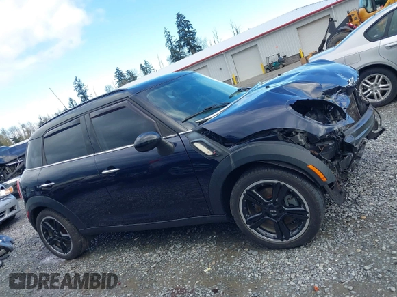 2015 MINI Countryman S z VIN WMWZC3C57FWT06297, wystawiony jako IAAI lot #41988157 z przebiegiem 74 461 mil mil oraz . Historia ofert i sprzedaży dostępna na DreamBid. Obrazek 14.