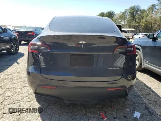 2024 Tesla Model Y Long Range z VIN 7SAYGDEE3RA323029, wystawiony jako Copart lot #50171805 z przebiegiem Nie podano mil oraz Szkoda całkowita • Salvage title. Historia ofert i sprzedaży dostępna na DreamBid. Obrazek 6.
