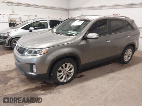 2014 Kia Sorento EX with VIN 5XYKU4A71EG435384, listed as a IAAI auction lot 41607160 with 143,622 mi miles and . Bid and sale history available at DreamBid. Image 2.