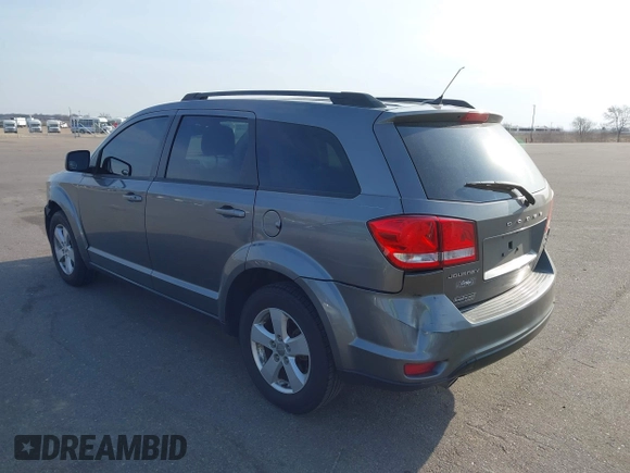 2012 Dodge Journey SXT z VIN 3C4PDCBG9CT208092, wystawiony jako IAAI lot #42065471 z przebiegiem 208 794 mil mil oraz . Historia ofert i sprzedaży dostępna na DreamBid. Obrazek 3.