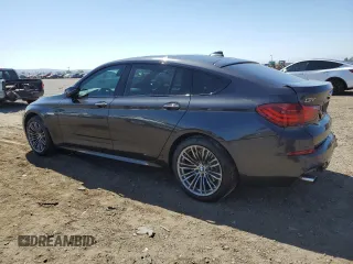 2014 BMW 5 Series GT 535i with VIN WBA5M2C55ED871907, listed as a Copart auction lot 73001564 with 90,576 mi miles and Salvage Title. Bid and sale history available at carsss.com. Image 2.