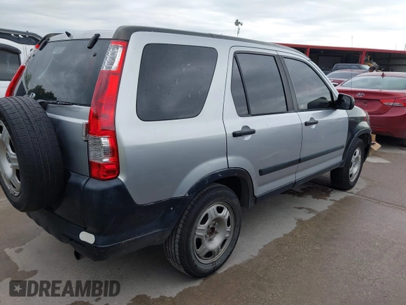 2005 Honda CR-V LX with VIN JHLRD78585C046494, listed as a IAAI auction lot 42182332 with 256,578 mi miles. Bid and sale history available at carsss.com. Image 4.