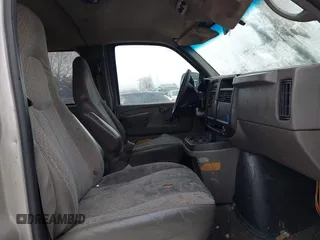 2005 Chevrolet Express Passenger with VIN 1GAHG39U151241968, listed as a IAAI auction lot 41281430 with 148,748 mi miles and . Bid and sale history available at DreamBid. Image 5.
