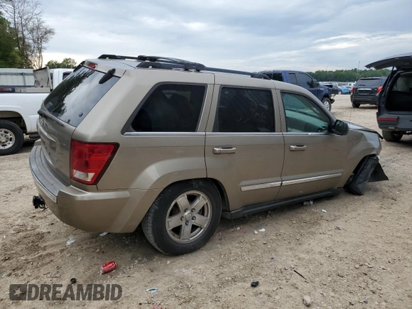 2006 Jeep Grand Cherokee Limited with VIN 1J4HS58N66C211974, listed as a Copart auction lot 60281945 with 220,229 mi miles and Salvage title. Bid and sale history available at DreamBid. Image 3.