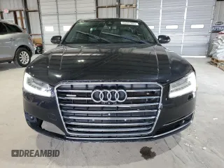 2015 Audi A8 3.0T z VIN WAU3GAFD2FN040940, wystawiony jako Copart lot #65327685 z przebiegiem 113 443 mil mil oraz Czysty tytuł • Clean title. Historia ofert i sprzedaży dostępna na DreamBid. Obrazek 5.